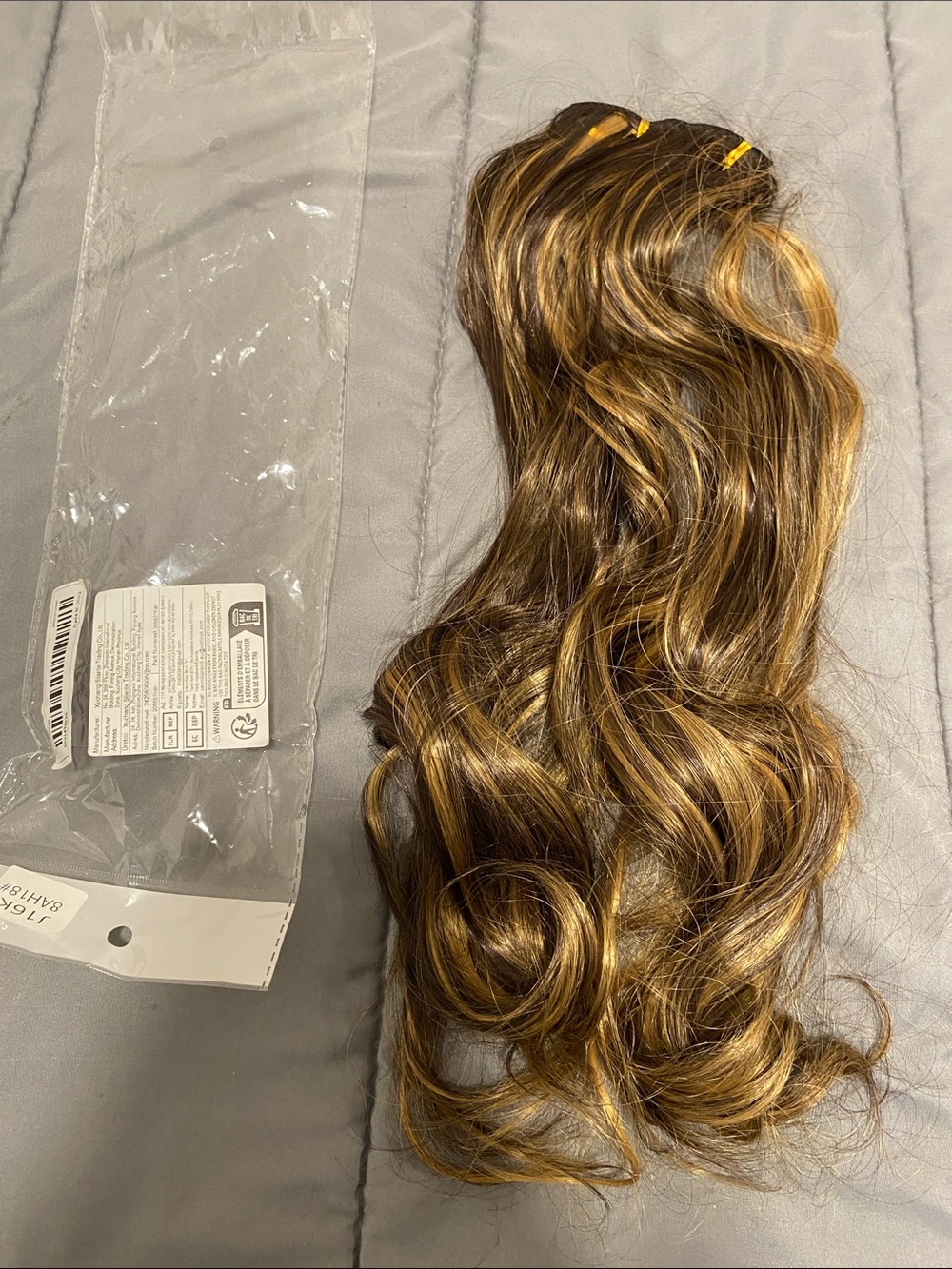 Clip-In Wavy Hair Extension in Brown with Blonde Highlights